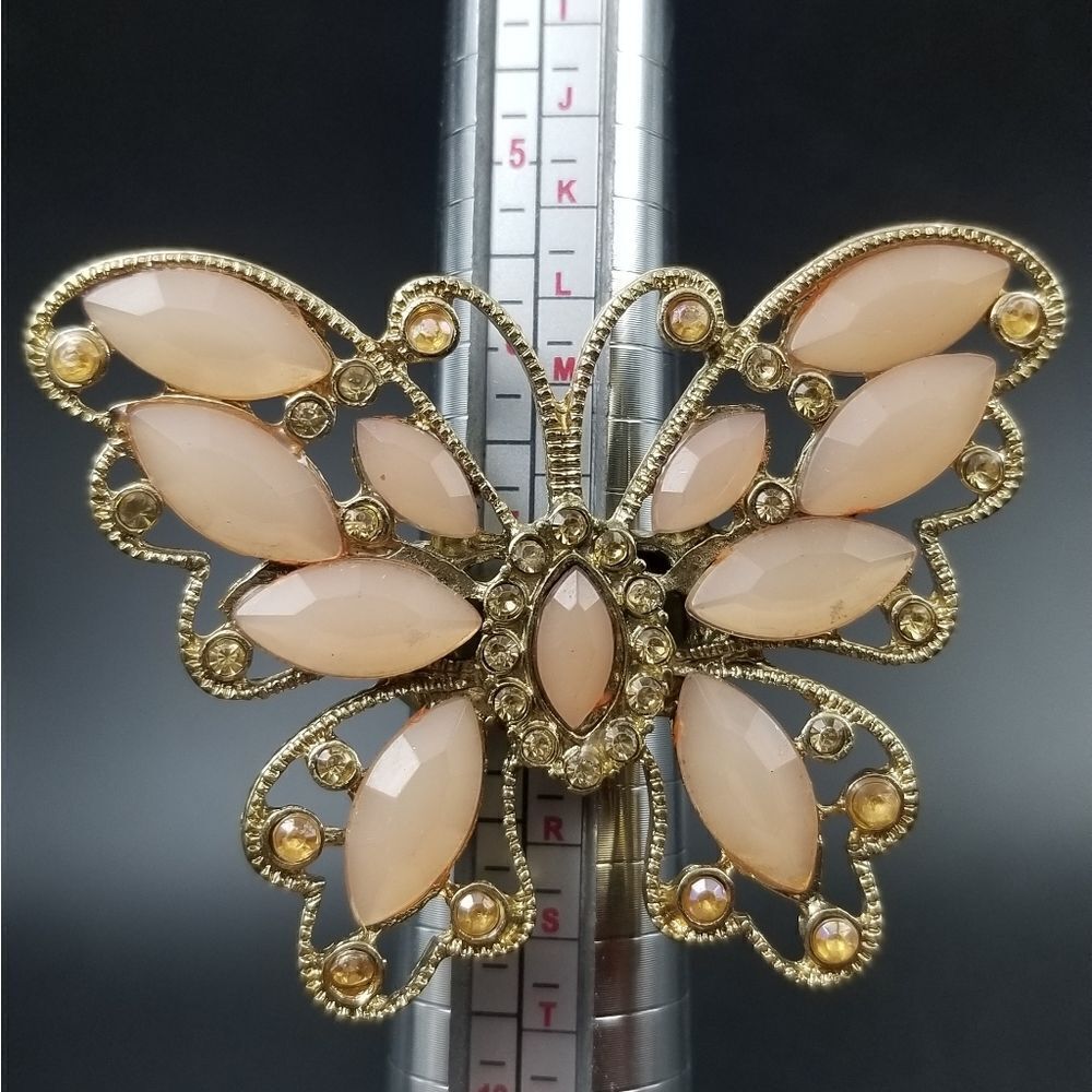 Pale pink cathedral butterfly ring adjustable sizing. R138